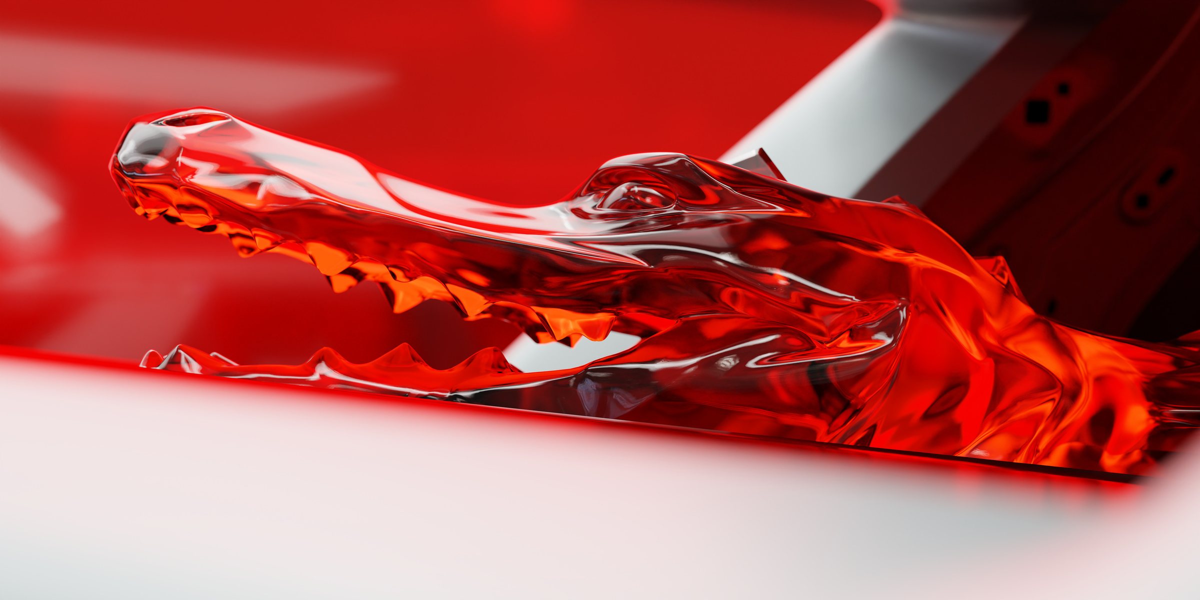Alpine × Lacoste : crocodile en verre rouge, en gros plan