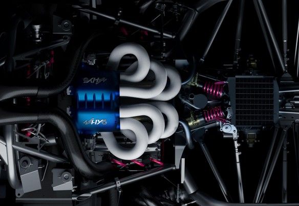 Moteur Hy6 vu de dessus : culasses bleues et collecteurs blancs dans le châssis